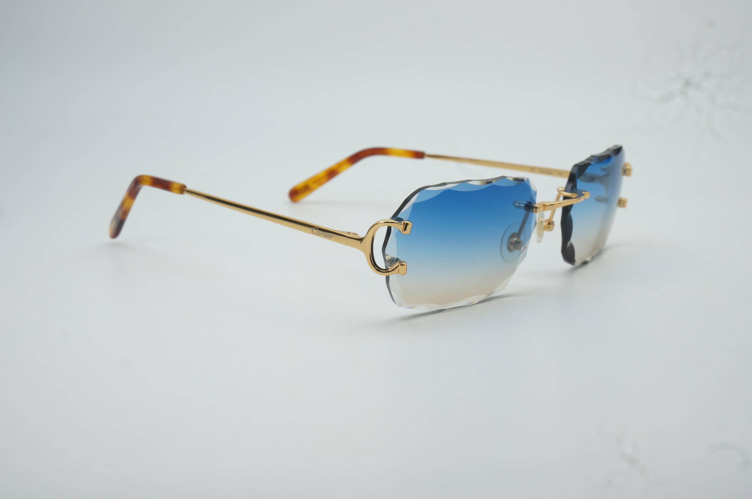 Diamond cut lens sunglasses